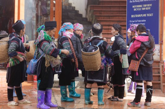 Group of H'Mong women in front of a hotel in Sa Pa.